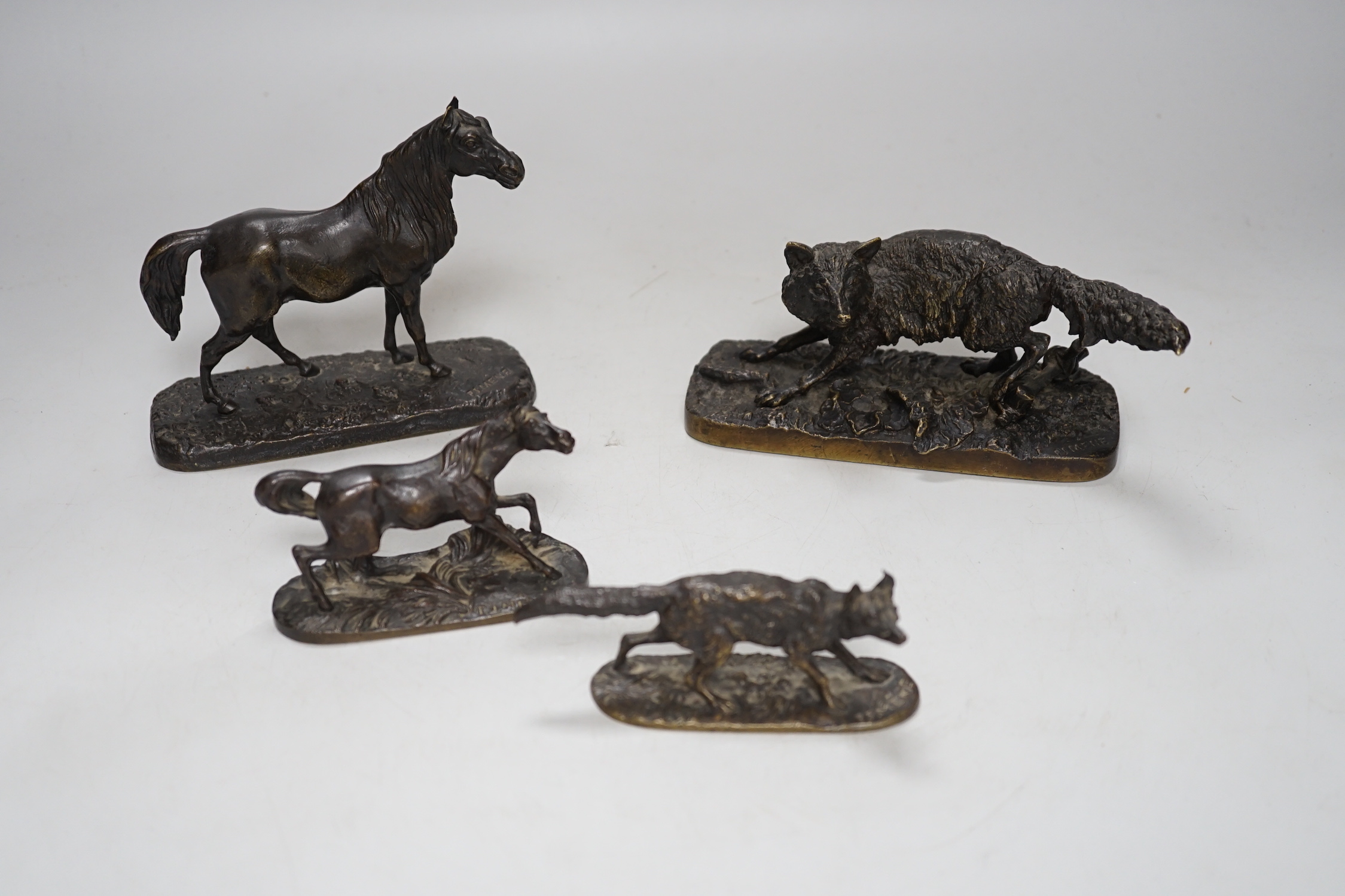 After Pierre-Jules Mêne (1810 – 1879) Four bronze models of foxes and horses, the largest 12.5cm wide